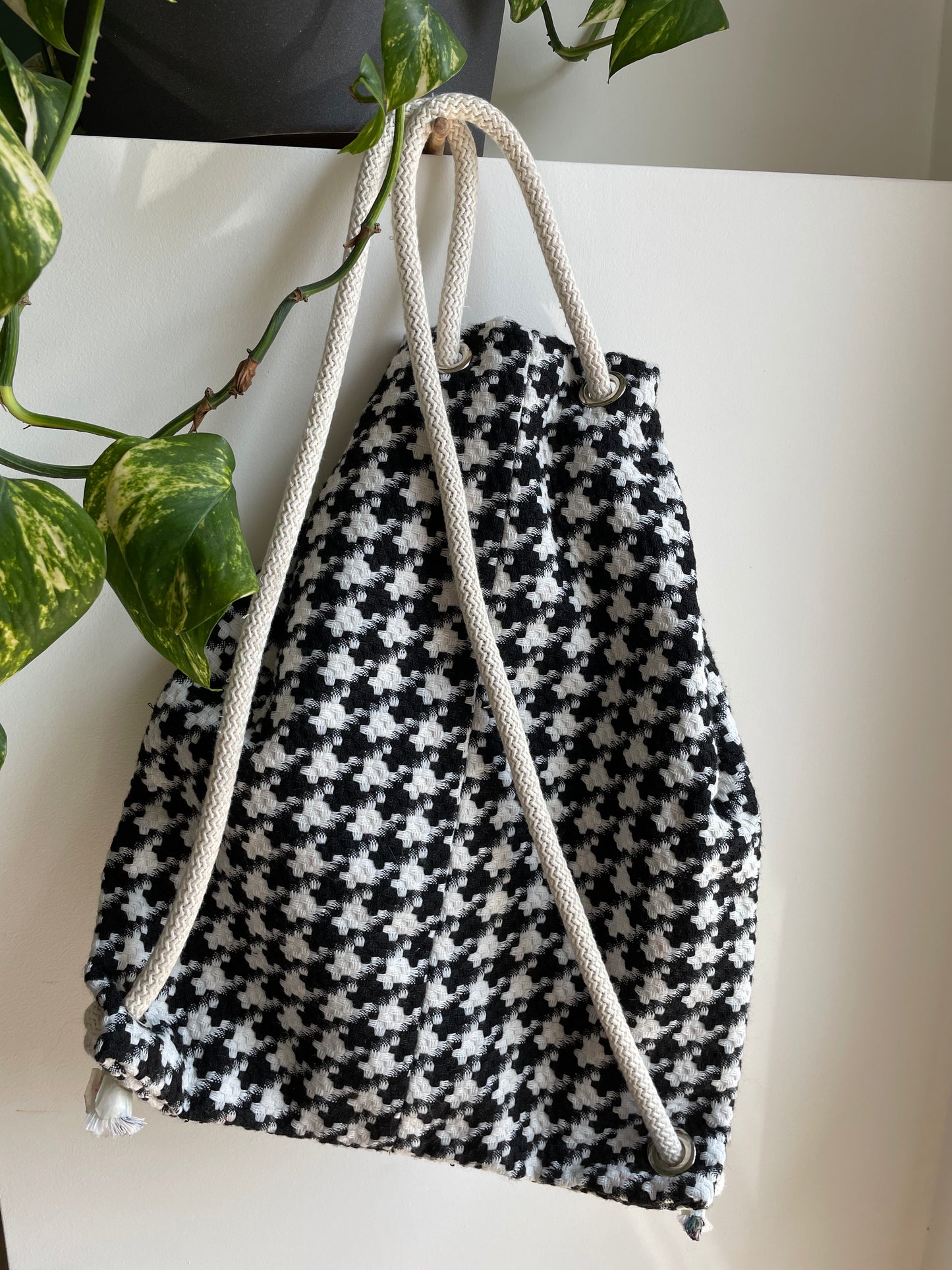 Black and white checked backpack